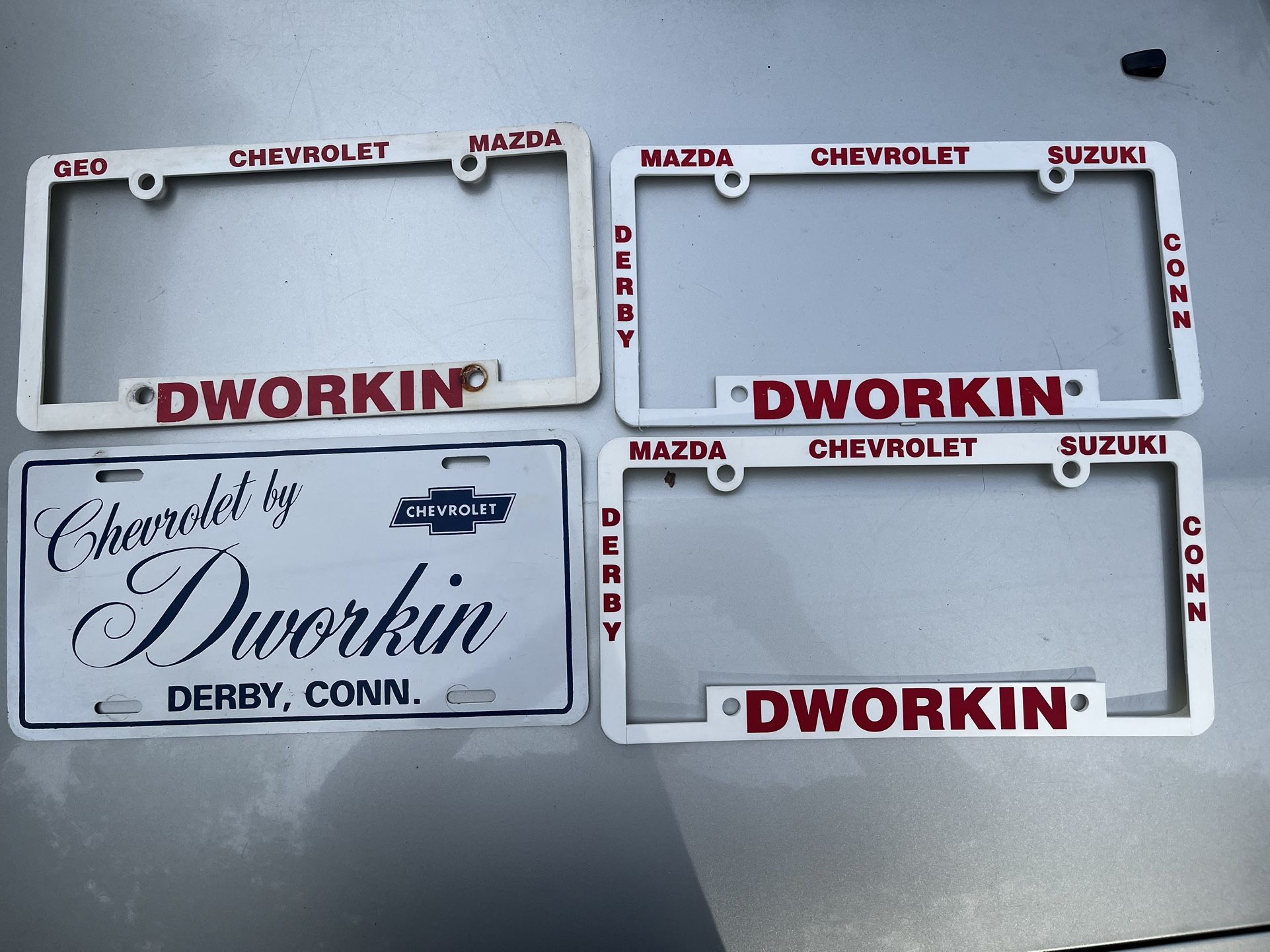 Four Vintage Dworkin Chevrolet Of Derby License Plate Frames