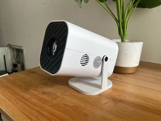 Brand new in box! Mini Projector with Wifi and Bluetooth, Built-in Apps,Movie Projector Electric Focus Portable Projector, 1080P Video Projector for B