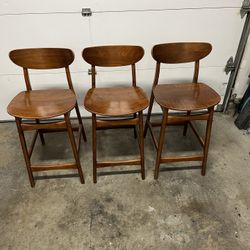 3- West Elm Classic Café Counter Stools in a Walnut finish. 