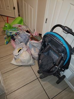 Stuffed animals, baby clothes, kids clothes 2t 3t , also added 4t pants n shirts , stroller all for 60 dollars priced to sell