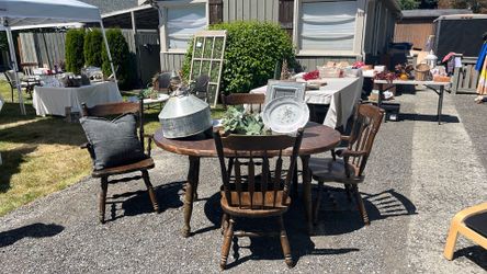 Sold wood dining table and 5 chairs