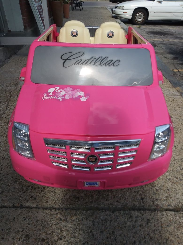 Power wheels 2024 pink escalade sale