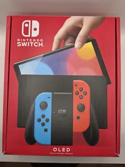 nEW Nintendo Switch - OLED Model with Neon Red & Neon Blue Joy-Con