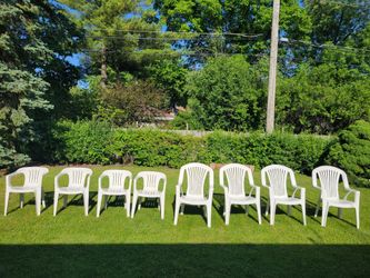 4th of July Special: 8 plastic white outdoor chairs