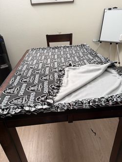 Raiders tie blanket