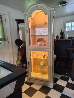 Beautiful lighted  2 door cabinet