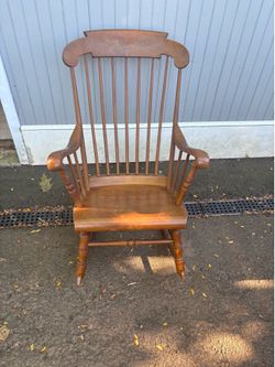 Colonial brown rocking chair great condition