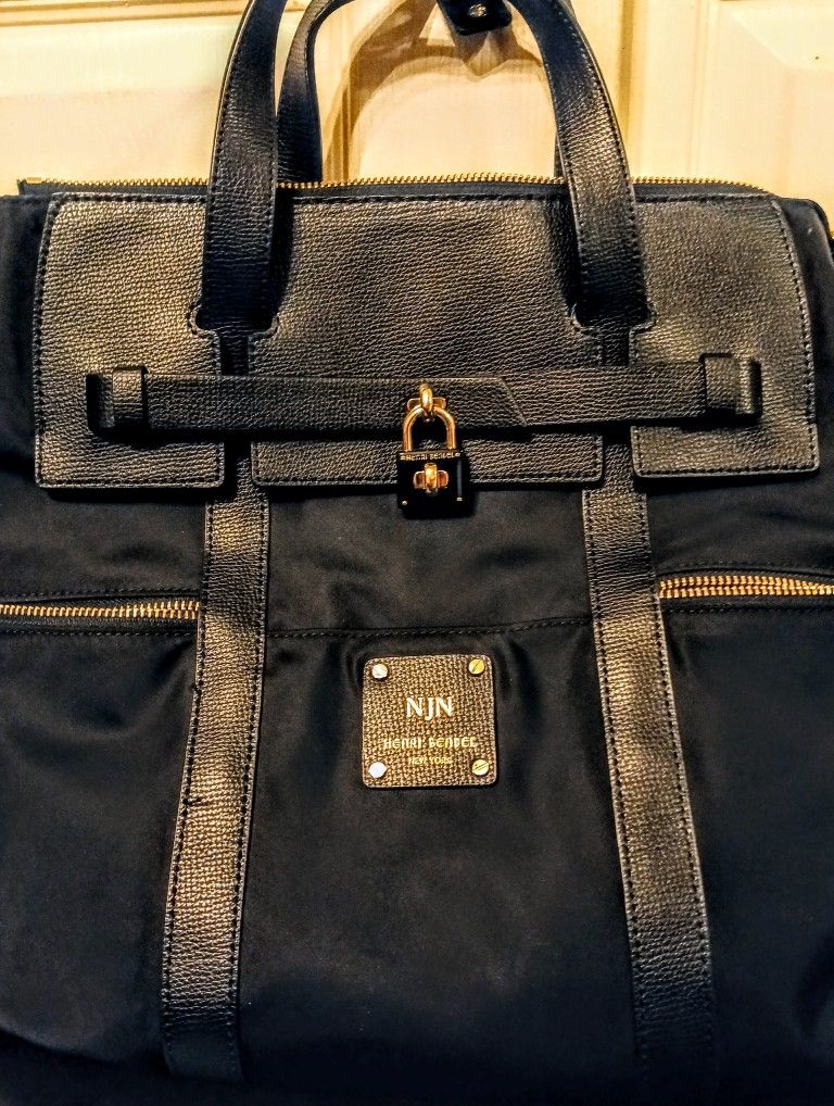 Henri Bendel Jetsetter Convertible Backpack – Black Leather & Gold
- Luxury