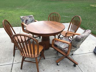 Solid oak table with 6 chairs