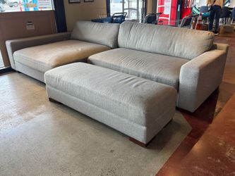 Spacious Grey 2Pc. Sectional w/ Wide Ottoman
