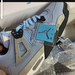Retro Jordan 4s University Blue
