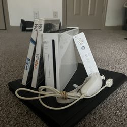 Nintendo Wii With 2 Controllers And 2 Games
