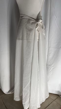 Woman’s Shear White Swimwear over up skirt . Size S-M