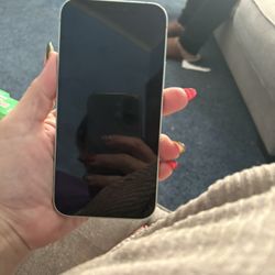 2 IPhones A 12 And A 14  