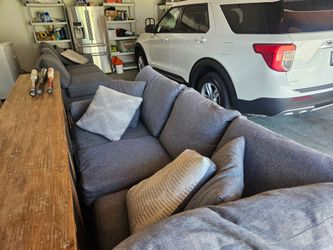 Large Gray Sectional Sofa with Pillows