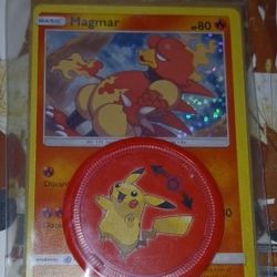 Sealed Magmar card and coin