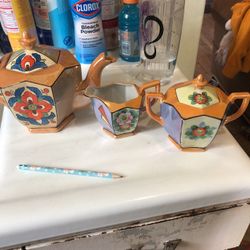 Vintage tea, pot with creamer and sugar