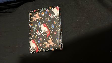 Christmas theme Rick and Morty bifold wallet from Buckle-Down