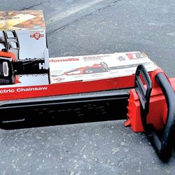 Brand New Homelite 16-Inch 12-Amp Electric Chainsaw Featuring Automatic Bar And Chain Oiler.