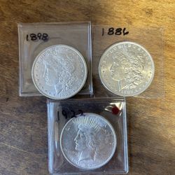 Three Silver Dollars. Group 17.