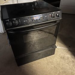 Glass top convention slide in GE profile, stove, electric