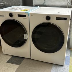 New LG Front Load Washer And Gas Dryer 