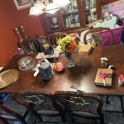Table, Chairs + Curio 
