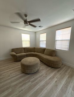 Curved Sectional Sofa with Round Ottoman
