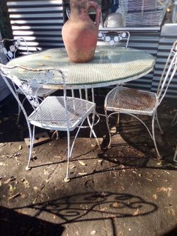 Vintage wrought patio table set with glass $600