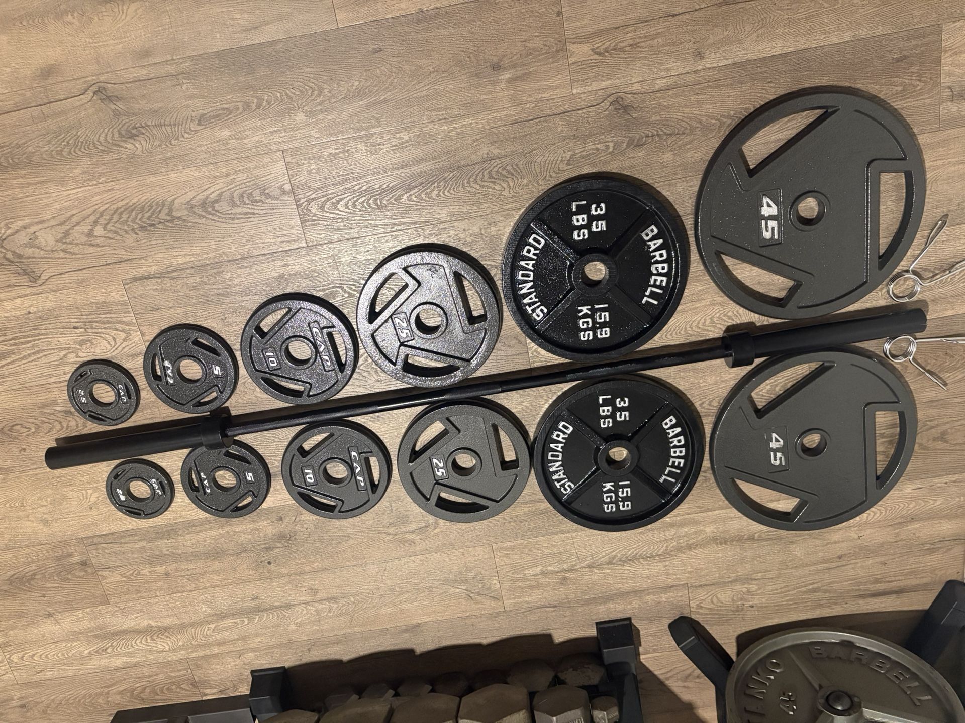 NEW Olympic Equipment: 6 ft Black Barbell With Weight Plates: 45s to 2.5s Total: 283 lbs