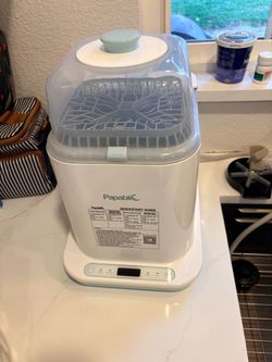 Bottle washer, sanitizer and drier