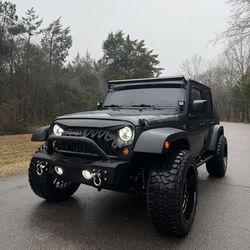 2016 Jeep Wrangler 4x4 with 76k miles