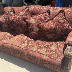 Ornate Red And Gold Couches