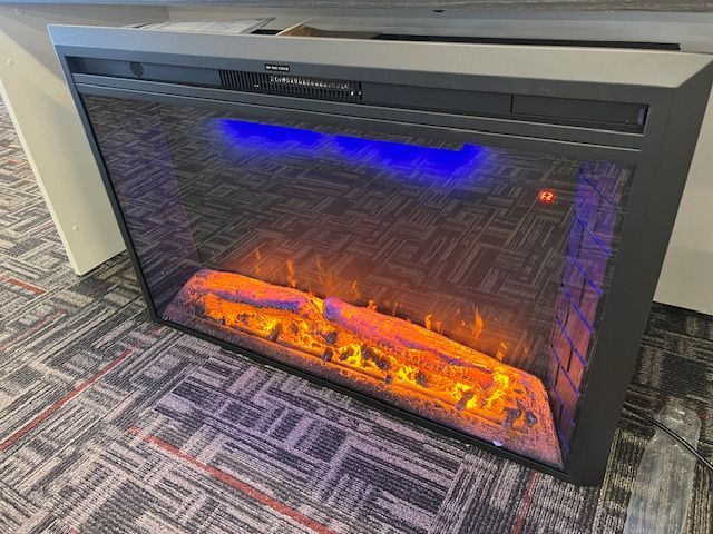 ELECTRIC FIRE PLACE WITH REMOTE // WE DELIVER