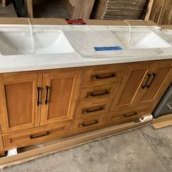 60” Bathroom Vanity in teak , double sink soft close solid wood with vanity top in white  $899  Luke’s liquidations warehouse Address:  2434 N Forsyth