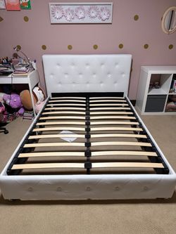 Full size white bed