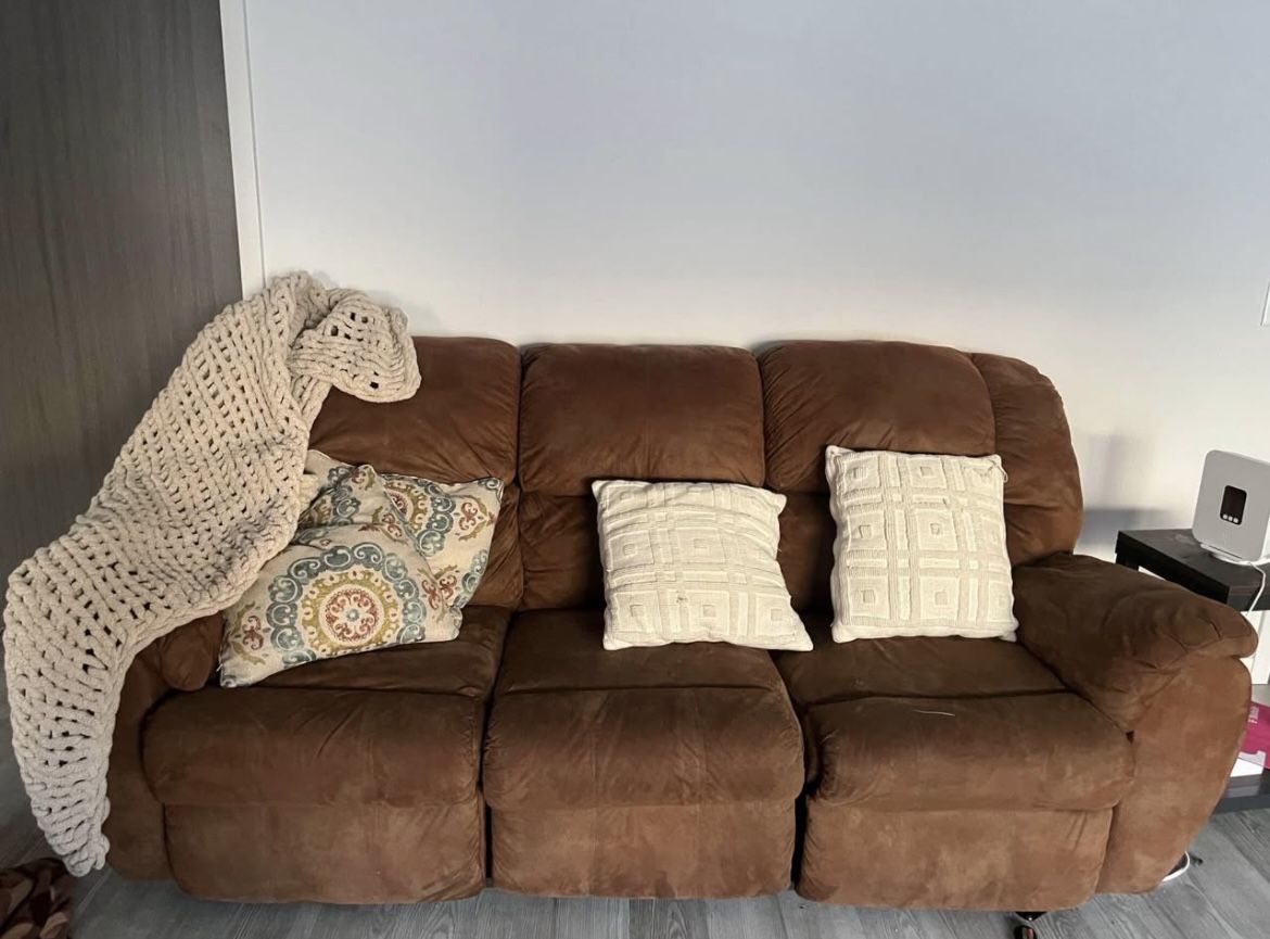 Reclining love seat and couch set