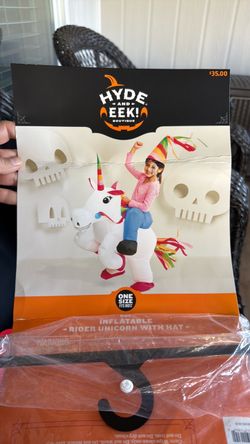 Inflatable ride unicorn with hat