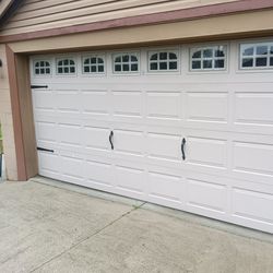 2 solid garage door panels 