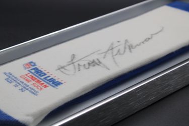 NFL Pro Line "Lineman Game Sock" hand-signed by Dallas Cowboys Hall of Fame Quarterback Troy Aikman.