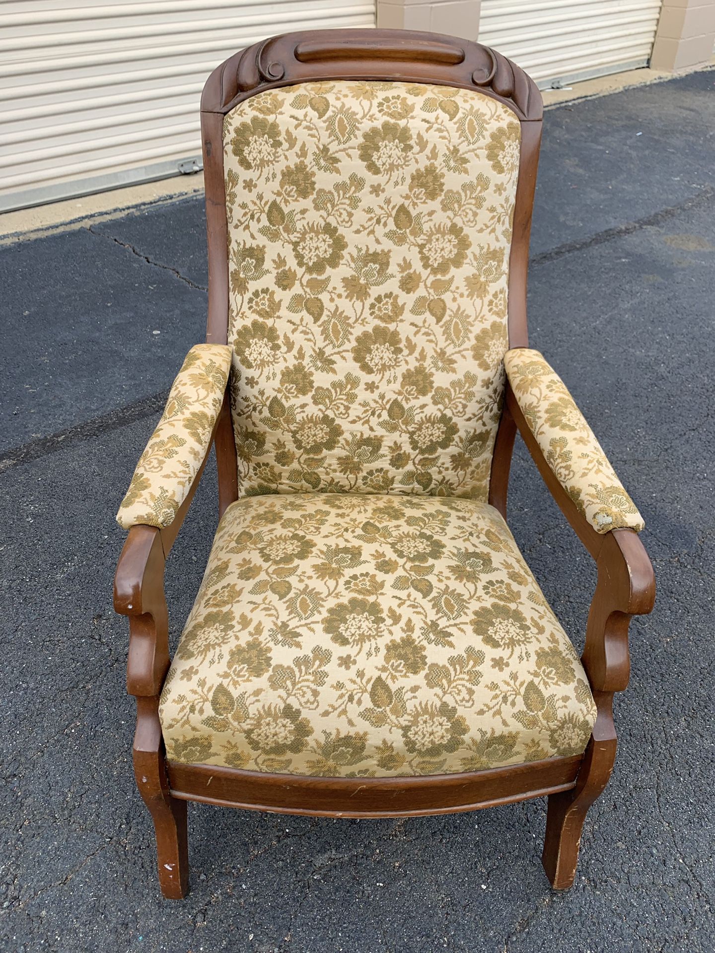 Victorian era armed chair with wheels