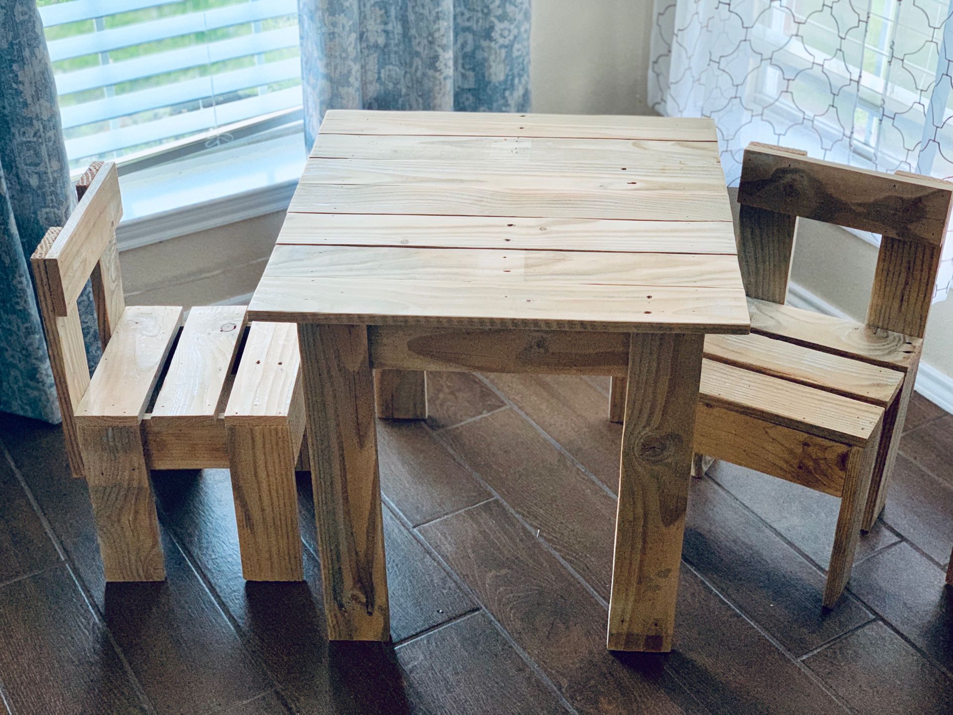 Wooden kids table with two chairs