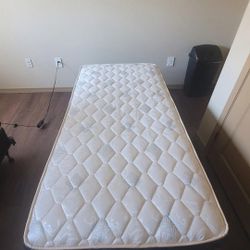 A TWIN SIZED BED