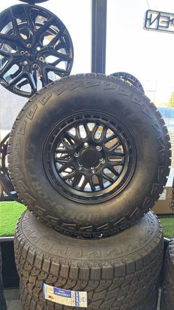 17" Matte Black Wheel with LT305/70R17 All-Terrain Tire