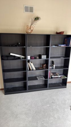 Large black bookshelves