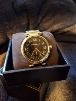 Gold mk watch