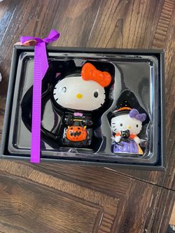 Hello Kitty Halloween mug and figurine