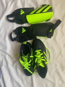 Adidas Soccer cleats and shin guards, Size 1, Green and Black