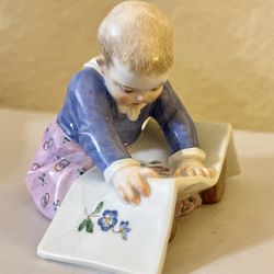 Meissen Figurine  Child With Picture Book”