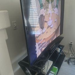 Samsung UHD 65 inch curve TV with TV stand ( Rotating) It includes XBOX 1 with 2 remote and Kinect and connecting wire  